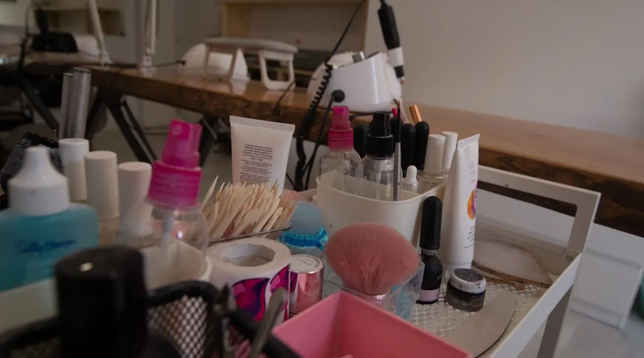 Manicure table with tools and nail polishes